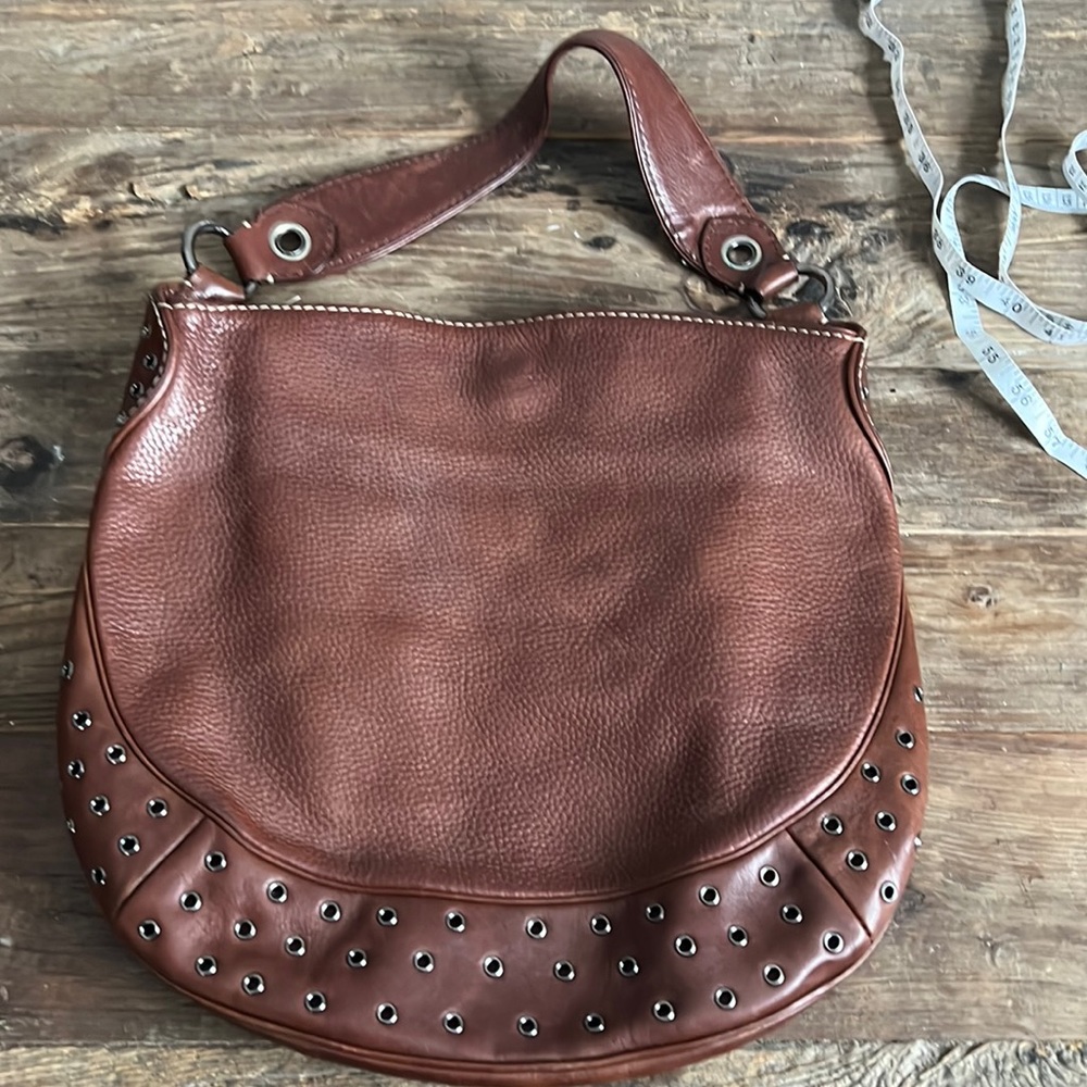 Michael Kors leather bag with grommet detail